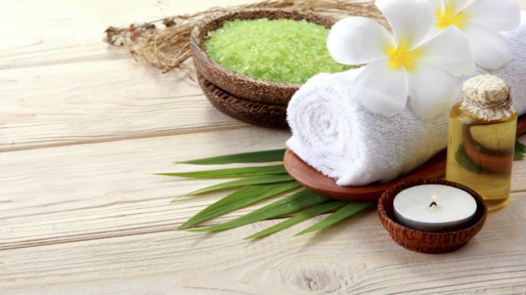 spa with candle and towel 